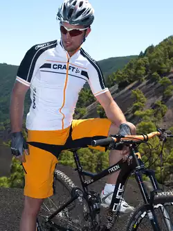 CRAFT Performance Bike Loose Fit męskie szorty rowerowe 1900683-2560, kolor: pomarańczowy